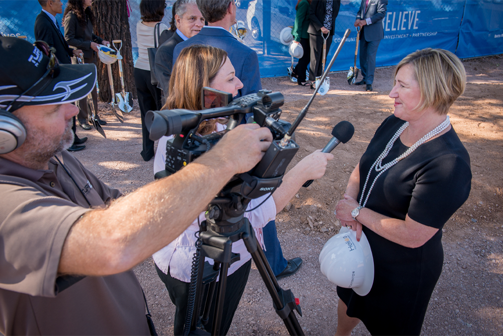 Jane LaRocca Roig being interviewed at Helios Education Campus groundbreaking